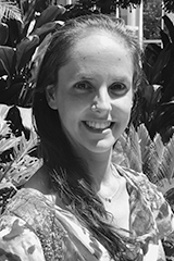 Headshot of Caroline Mills.