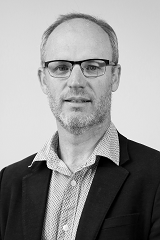 Headshot of Nathan Wilson.