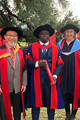 Benedict at graduation with supervisors.