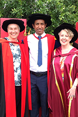 Zelalem and supervisors at graduation.