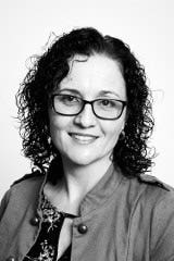Headshot of Kristy Coxon.