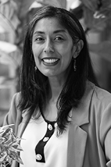 Headshot of Raksha Pandya-Wood.