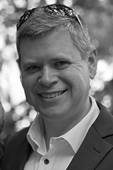 Headshot of Sam Arnold.