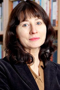 portrait photograph of a woman with shoulder-length hair